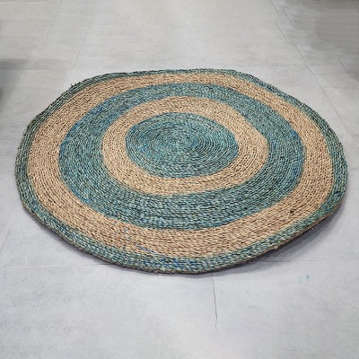 Concentric blue striped round seagrass sheets