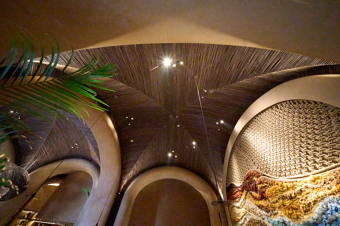 Custom rattan ceiling materials fabricated according to architectural specifications