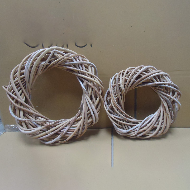 Willow wreaths displayed as rustic wall art and seasonal decorations in living space