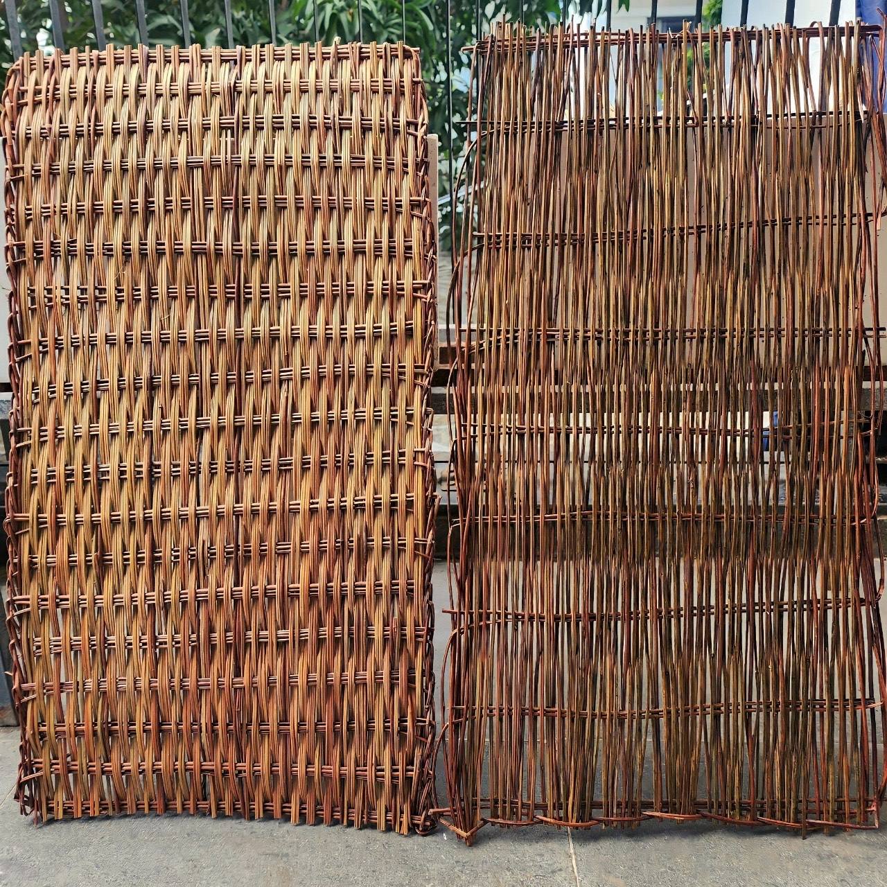 Woven willow fence panels creating a natural outdoor garden transition matching interior rustic decor
